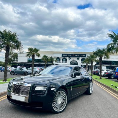 Black Rolls-Royce Ghost chauffeur car at The City Pavilion, London